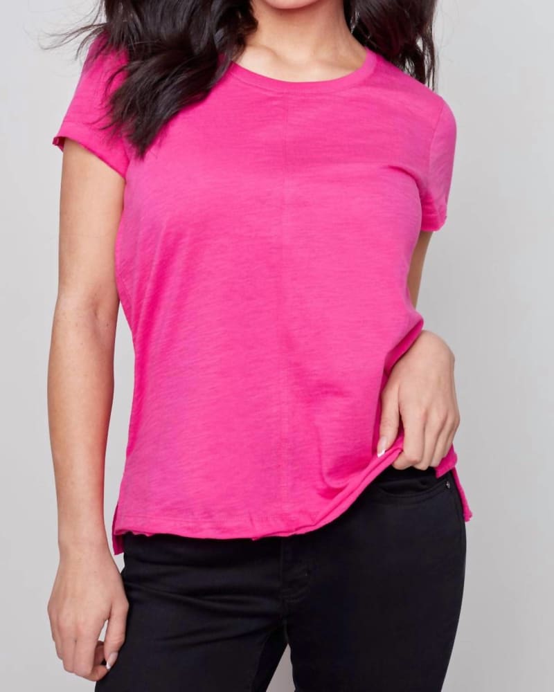 Front of a model wearing a size L Solid Short Sleeve Top in Watermelon in Watermelon by CHARLIE B. | dia_product_style_image_id:340276